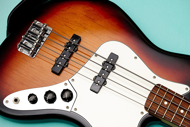 J-Style pickups on a Jazz bass. Notice how it has two pole-pieces per string