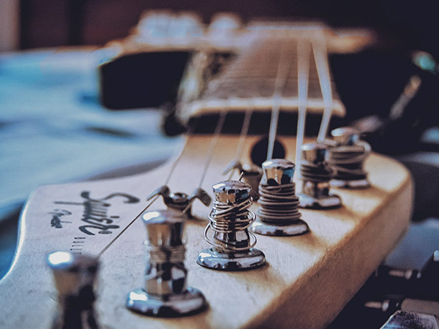 New Guitar Strings on an Electric Guitar