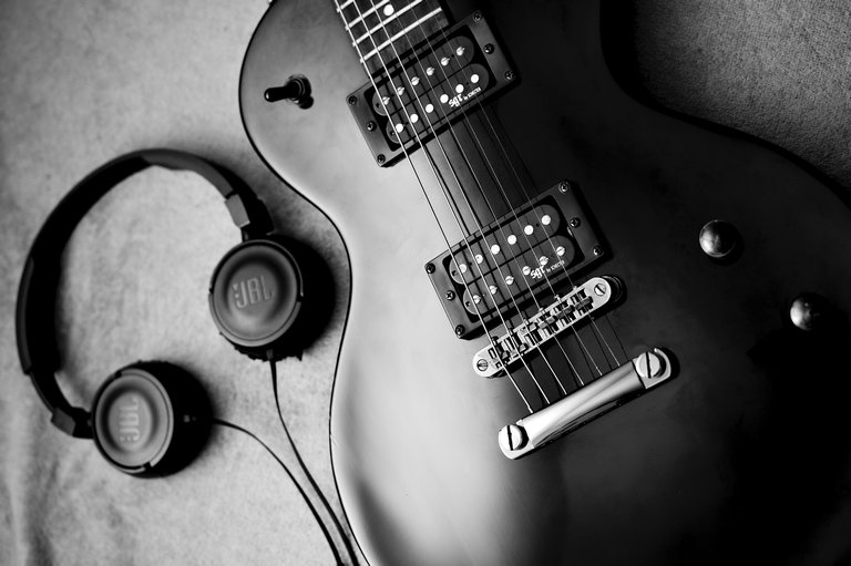 Electric guitar with JBL headphones